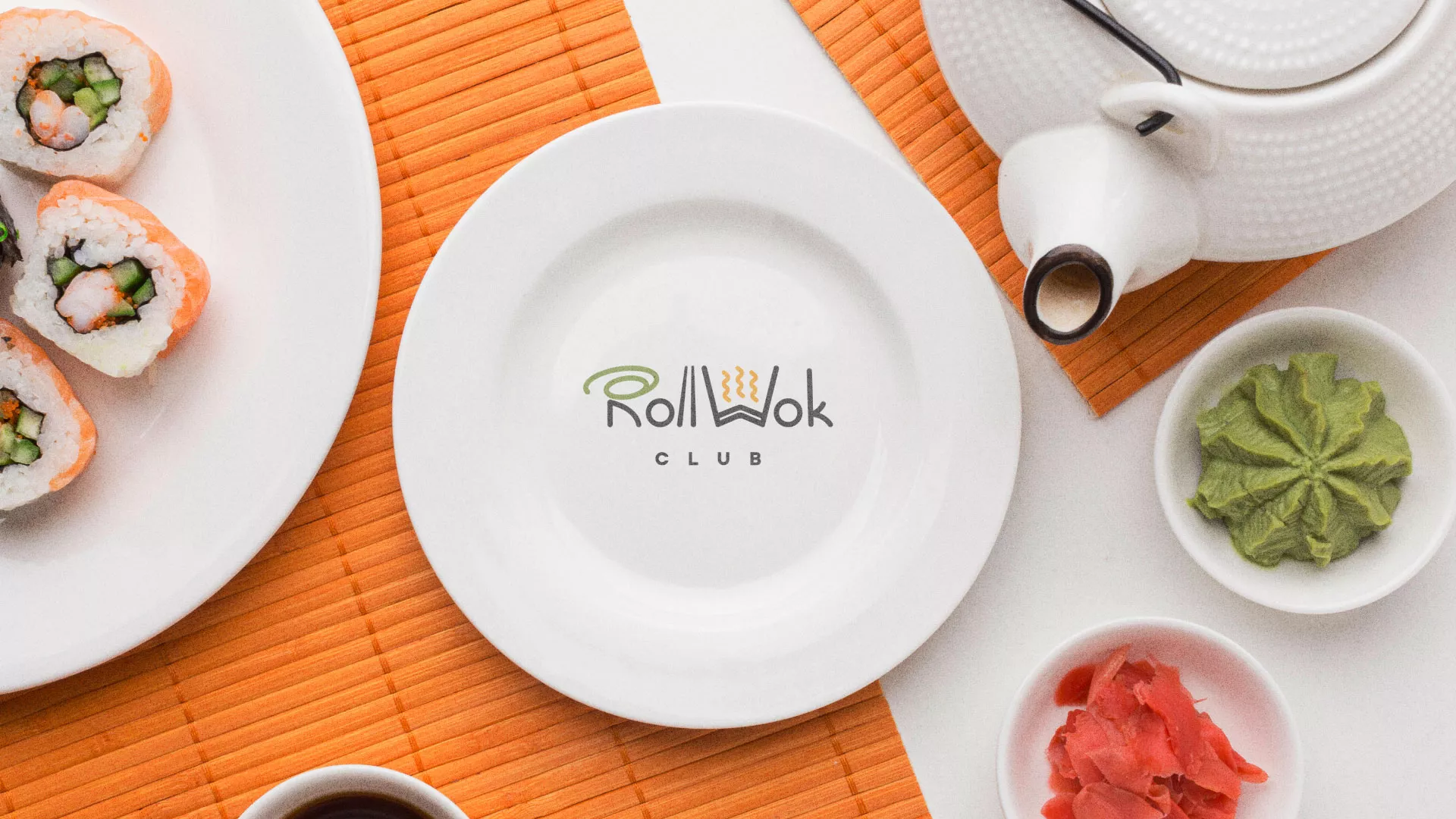 Разработка логотипа и фирменного стиля в Северодвинске для суши-бара «Roll Wok Club» Разработка логотипа и фирменного стиля в Северодвинске для суши-бара «Roll Wok Club»